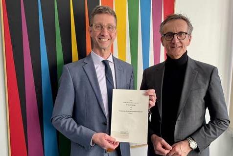 David Kemper und Dr. Jens Blüggel vom Landessozialgericht NRE