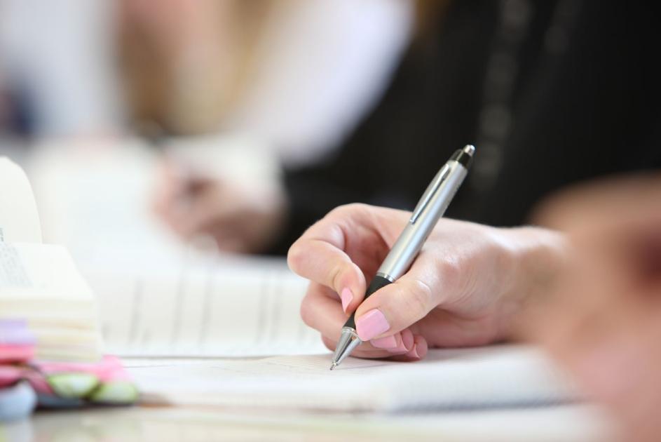 Hand mit Stift