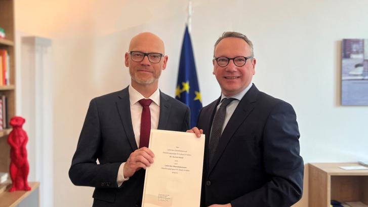 Minister und Dr. Gunnar Greier